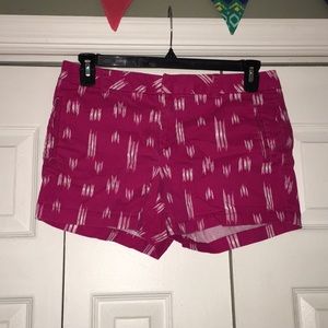 Pink shorts with a white pattern